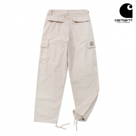 Бежевые штаны с накладными карманами Carhartt на затяжках снизу