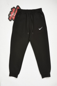 Чёрные спортивные штаны Nike на резинке с завязками