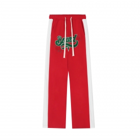 Свободные красные штаны SEVERS с винтажной зеленой вышивкой