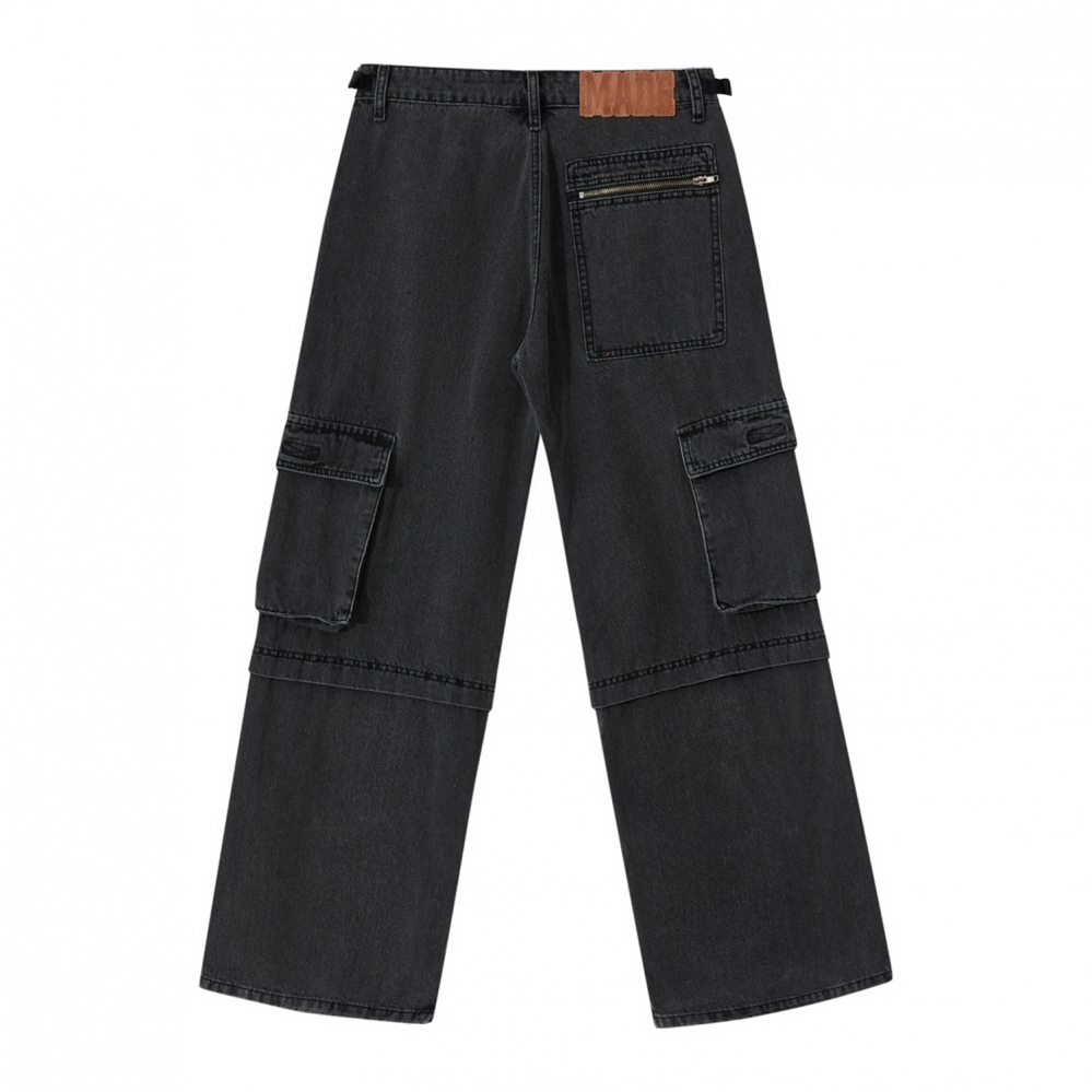 Чёрные джинсы с карманами по всей длине от Made Extreme разрез внизу