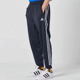Тёмно-синие Adidas спортивные штаны с резинкой внизу