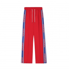 Оригинальные красные штаны от SEVERS с надписями на лампасах KIX HEAT