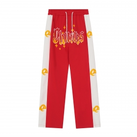 Стильные красные штаны SEVERS c яркой надписью спереди Churros