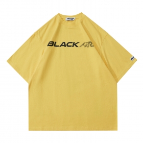 Жёлтая футболка от Made Extreme с логотипом на груди, принт на спине.