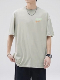 Стильная удлинённая серая футболка с логотипом на груди Nike