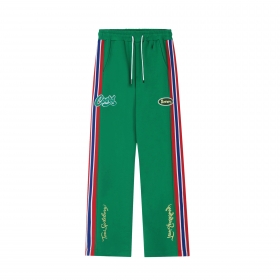 Оригинальные зеленые штаны SEVERS с брендовыми вышивками спереди