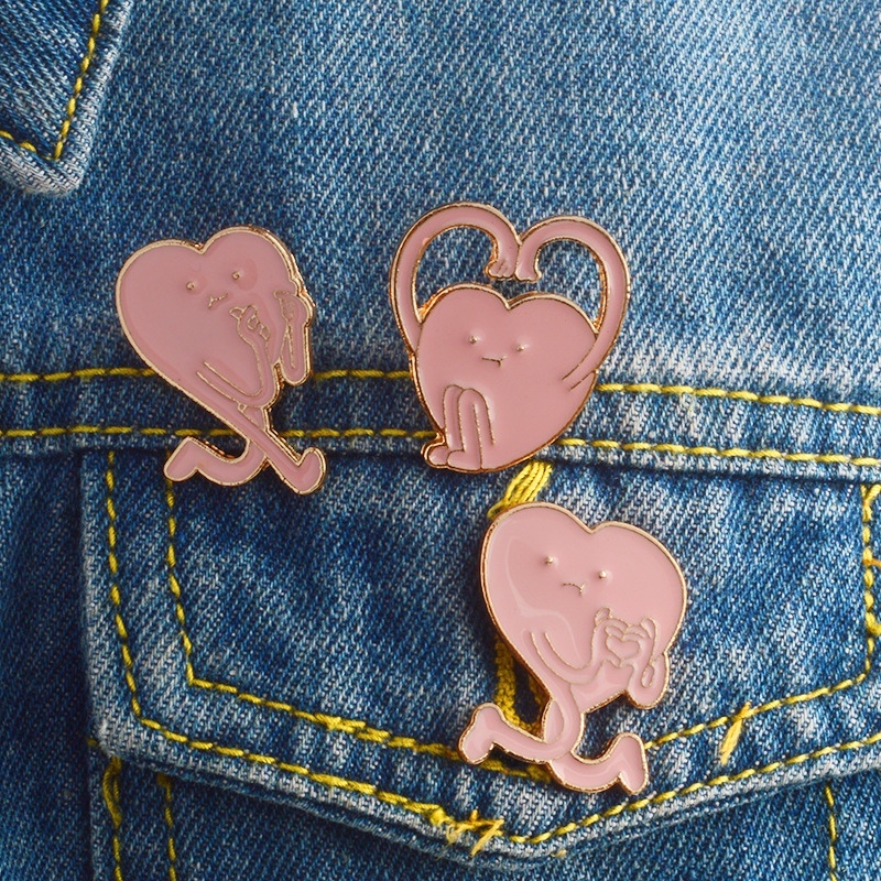 Пины изображающие розовые сердечки с ручками и ножками