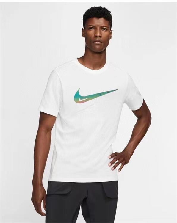 Белая 100% хлопковая футболка Nike свободного кроя с круглым вырезом