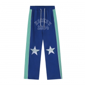 Стильные синие штаны SEVERS с вышивкой на звездах в области колен