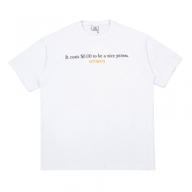 Белая хлопковая футболка VETEMENTS WEAR с принтом текста на груди