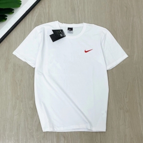 Универсальная белого-цвета Nike футболка с округлым вырезом горловины