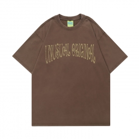 Оверсайз темно-коричневая футболка Unusual с принтом позвоночника