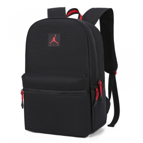 Чёрный аккуратный рюкзак фирмы Jordan с красными яркими акцентами