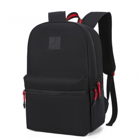 Чёрный рюкзак фирмы Nike Jordan с красными акцентами и чёрным лого