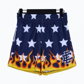 Темно-синие шорты бренда Eric Emanuel с звездно-огненным принтом