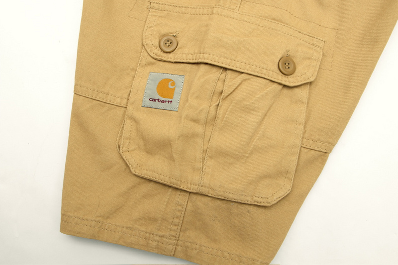 Песочные шорты Carhartt с карманами на пуговицах и брендовым лого