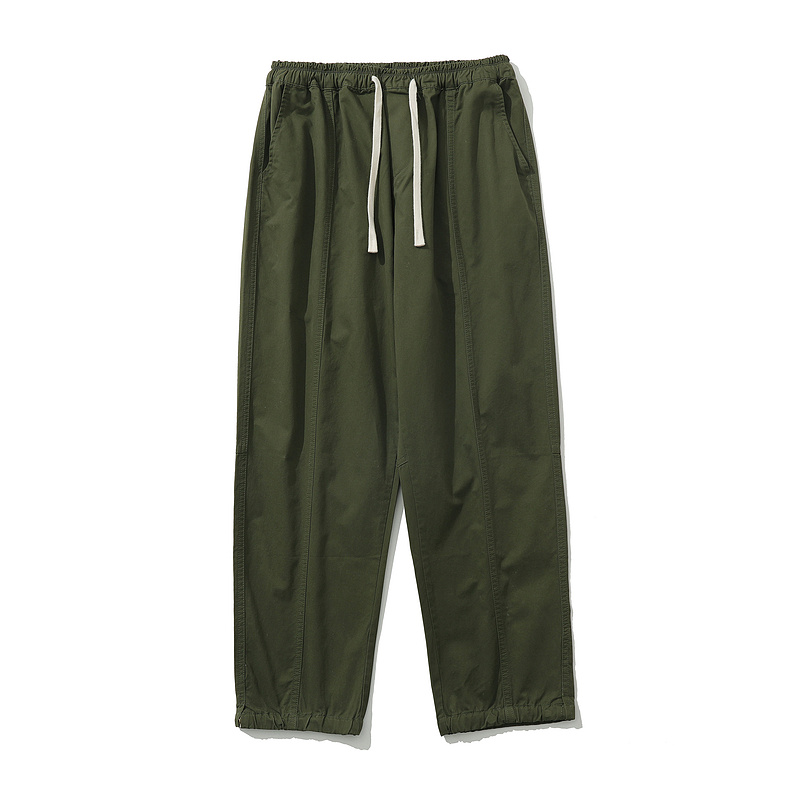 Джоггеры TXC Pants темно-зелёного цвета широкие с регулировкой снизу