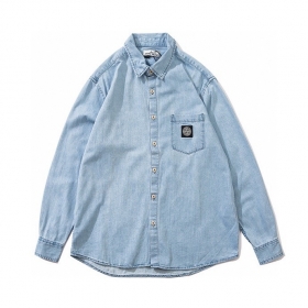 Светло-синяя джинсовая рубашка Stone Island c карманом и логотипом на груди