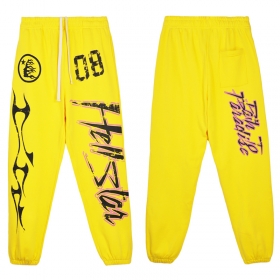 Яркие желтого цвета Hellstar штаны с большим лого на штанине