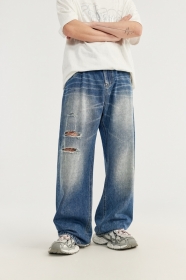 INFLATION синие джинсы с потертостями и рваными дырками на штанине