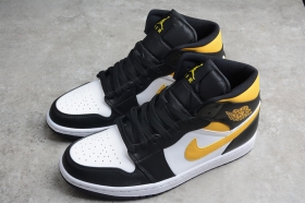 Чёрно-белые кеды Nike Air Jordan 1 Mid из кожи с золотыми вставками