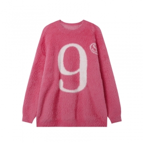 От бренда Spectra Vision розовый свитер с цифрой "9" на груди