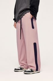 Розового цвета штаны INFLATION с темно-синими вставками
