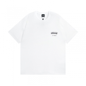 STUSSY футболка белого цвета с фирменным абстрактным принтом и лого