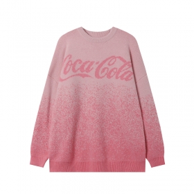 Розовый свитер от бренда Spectra Vision с надписью "Coca Cola"