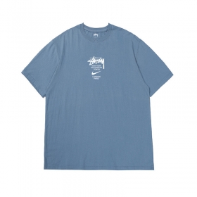 Голубая однотонная с принтом на груди Stussy x Nike футболка 