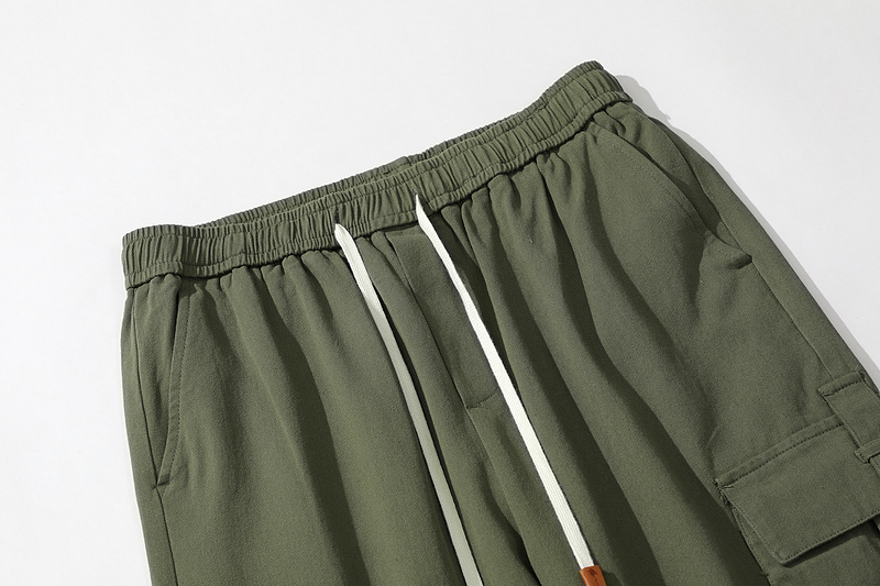 Джоггеры TXC Pants тёмно зелёного цвета с карманами по бокам