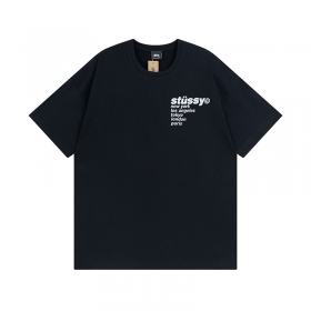 Стильная черная футболка Stussy с ярким принтом на спине