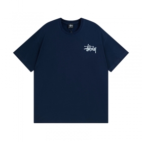 Темно-синяя футболка Stussy с ярким фирменным рисунком