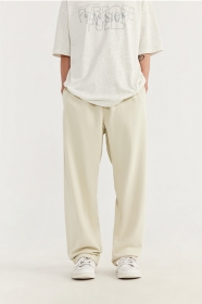 Бежевые штаны от бренда INFLATION из качественного материала
