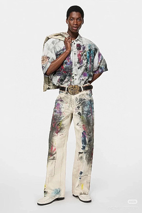 Acne Studios джинсы бежевого цвета с яркими мазками