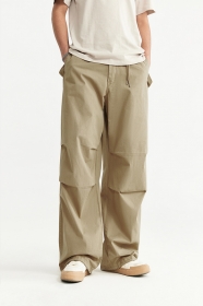 Бежевые качественные штаны от бренда INFLATION с карманами