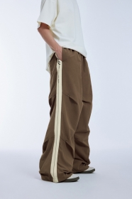 Стильные INFLATION в коричневом цвете штаны прямого кроя