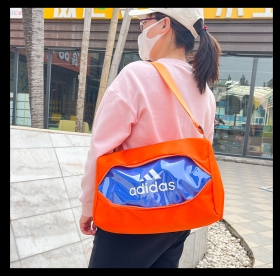 Спортивная Adidas оранжево-синяя сумка с длинным ремешком
