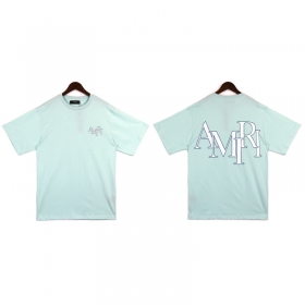 С белым буквенным рисунком футболка AMIRI мятного цвета