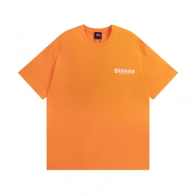 Базовая оранжевая футболка Stussy с большим абстрактным принтом