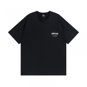 Черная футболка STUSSY с принтом в виде цветного пятна