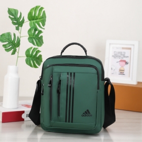 Универсальная в темно-зеленом цвете Adidas сумка с ремнем