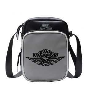 Чёрно-серая с логотипом Nike x Jordan сумка-барсетка 