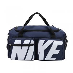 Синяя спортивная сумка с надписью Nike и 4 карманами снаружи