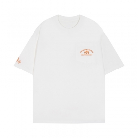 Белая с оранжевым логотипом Chrome Hearts на груди и спине футболка