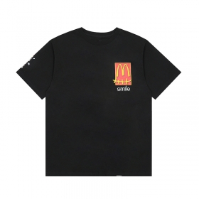 От бренда Cactus Jack футболка черного цвета с буквой "М"