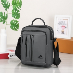 Adidas серая трендовая сумка с карманами на молнии и удобной ручкой