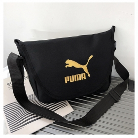 Чёрная стильная сумка бренда Puma на застёжке-липучке