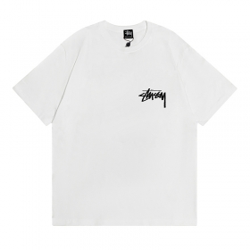 Белая футболка Stussy с фирменным лого и большим рисунком на спине