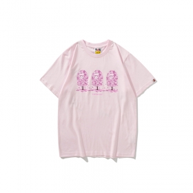 Розовая футболка с принтом на груди и лого на спине Bape Shark WGM